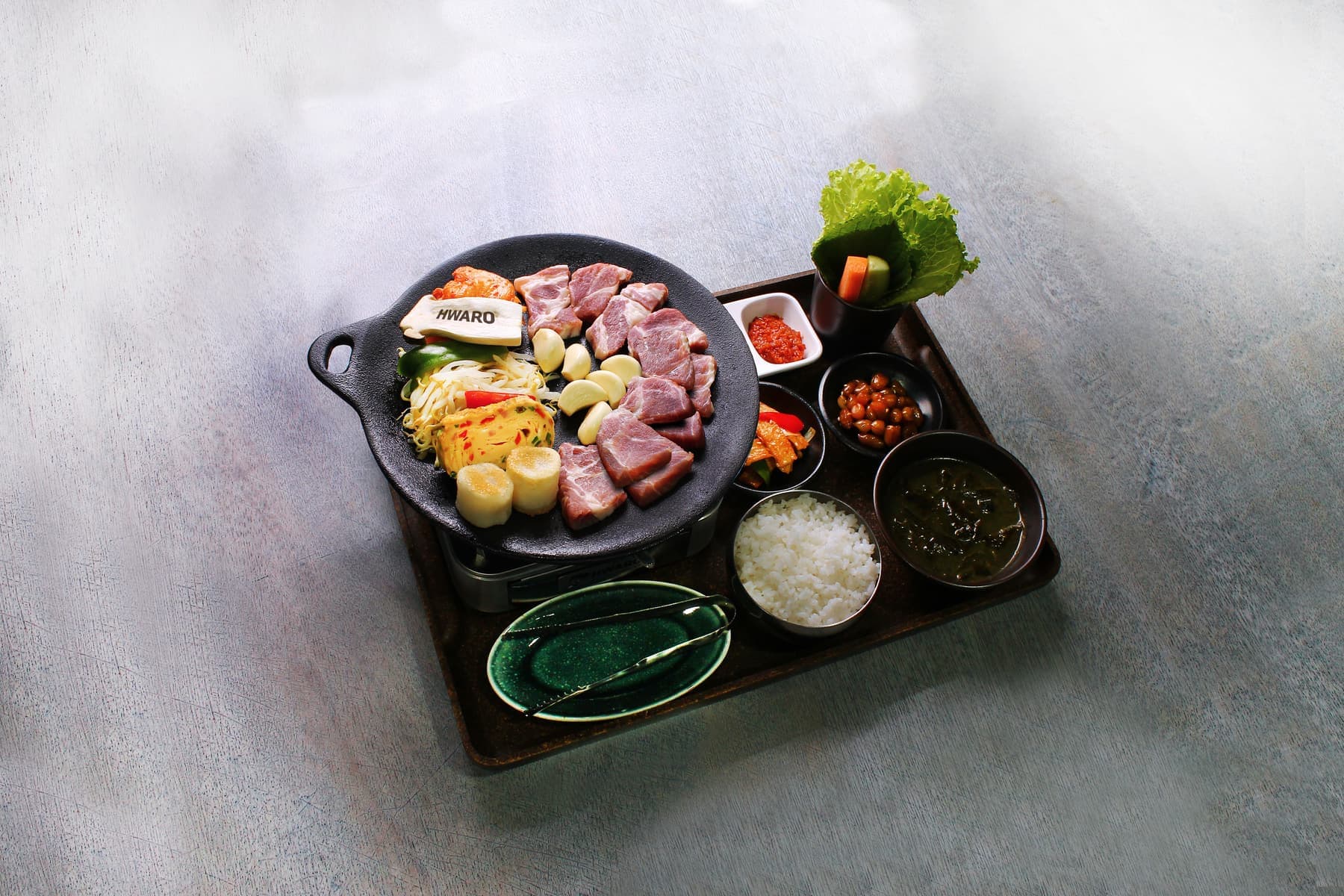 Moksal Griddle BBQ Set at Hwaro with banchan, rice and seaweed soup