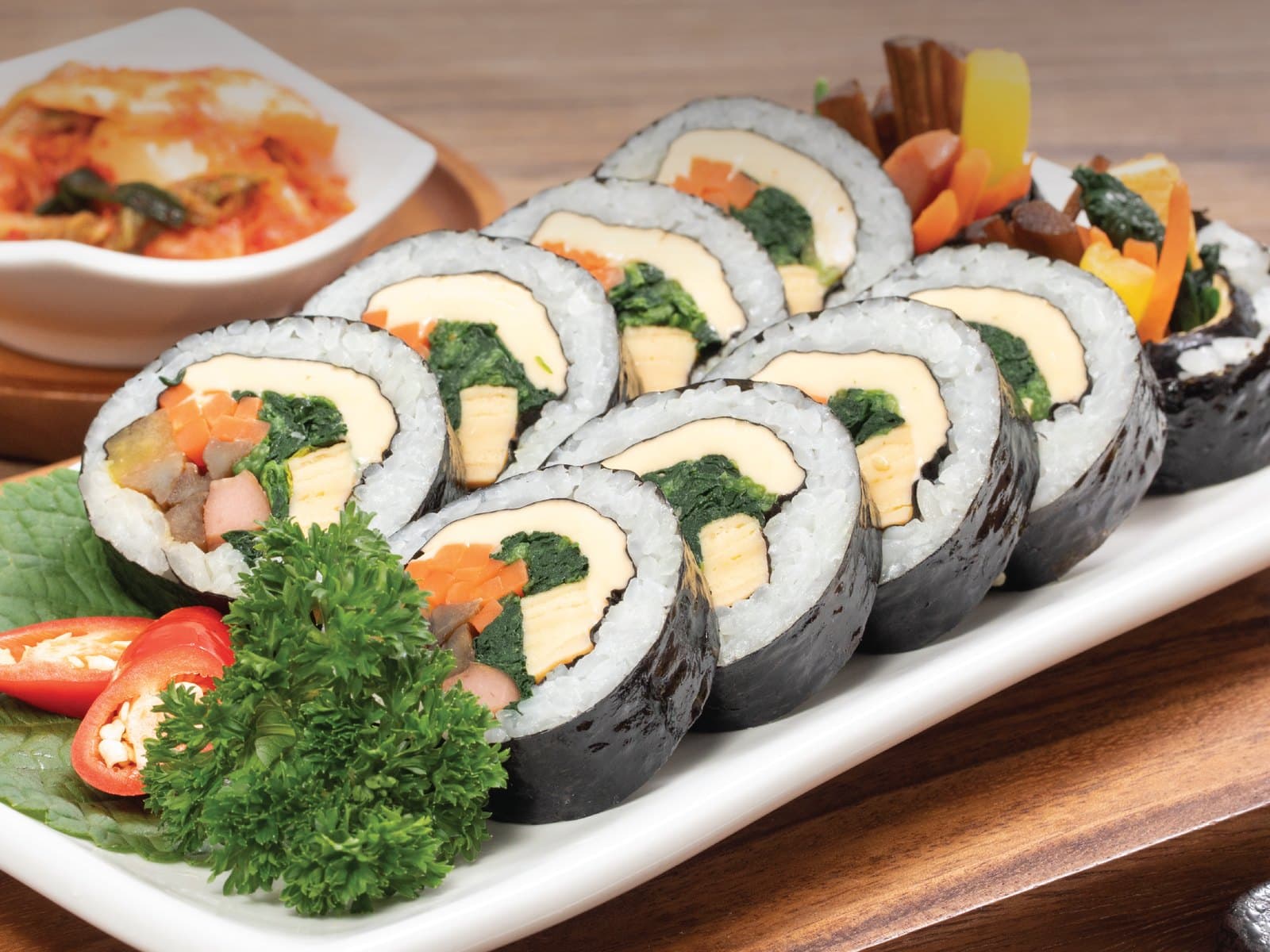 Kimbap rolls with kimchi at the family table