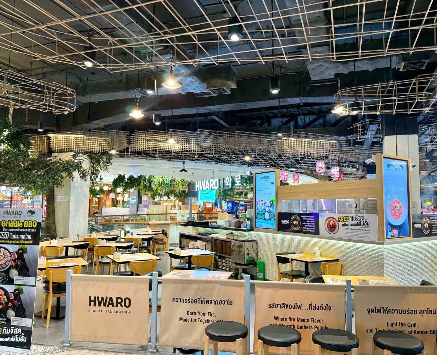 Inside Hwaro Central Ladprao, tables and griddle stations on the 4th floor